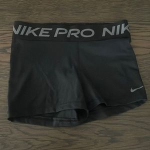 Black and white dry fit Nike pros size small
